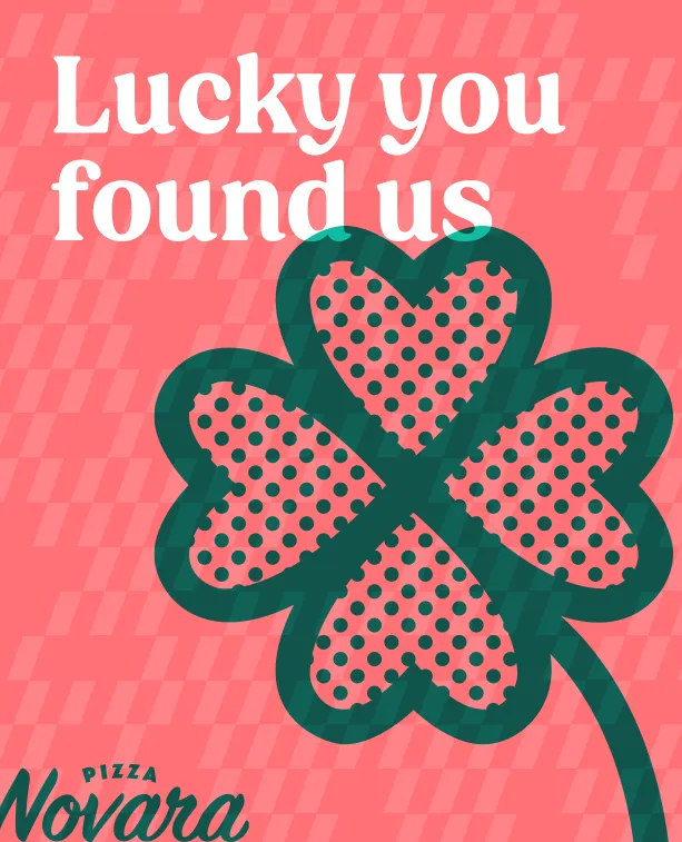 Pizza Novara wall art: a four-leaf clover under “Lucky you found us”