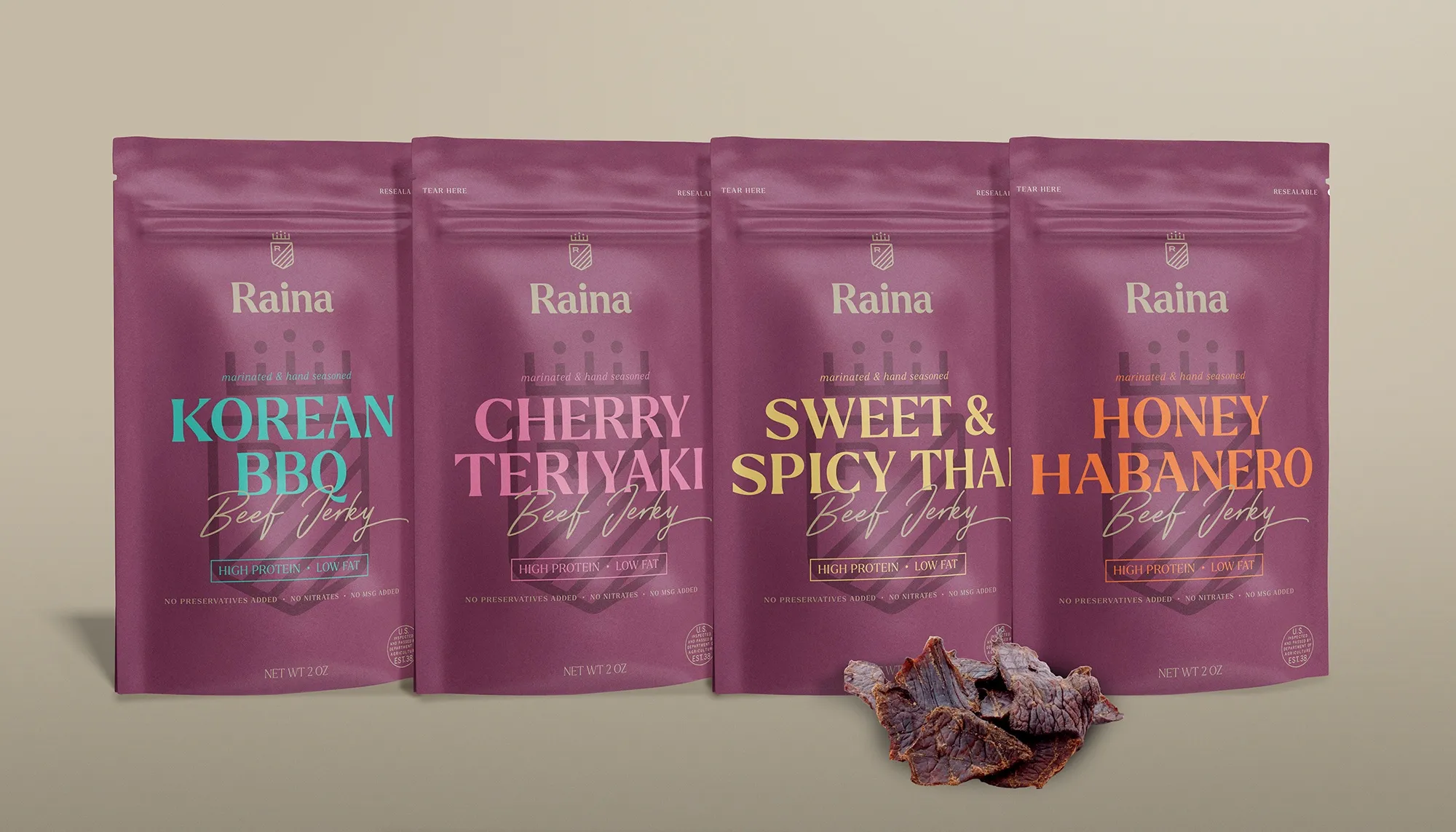 The four beef pouches in plum — Korean BBQ, Cherry Teriyaki, Sweet & Spicy Thai, Honey Habanero — each flavor in its own accent color