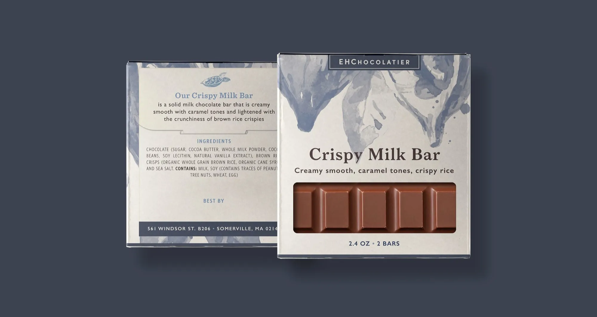 The Crispy Milk Bar box, front and back, on a slate-blue field