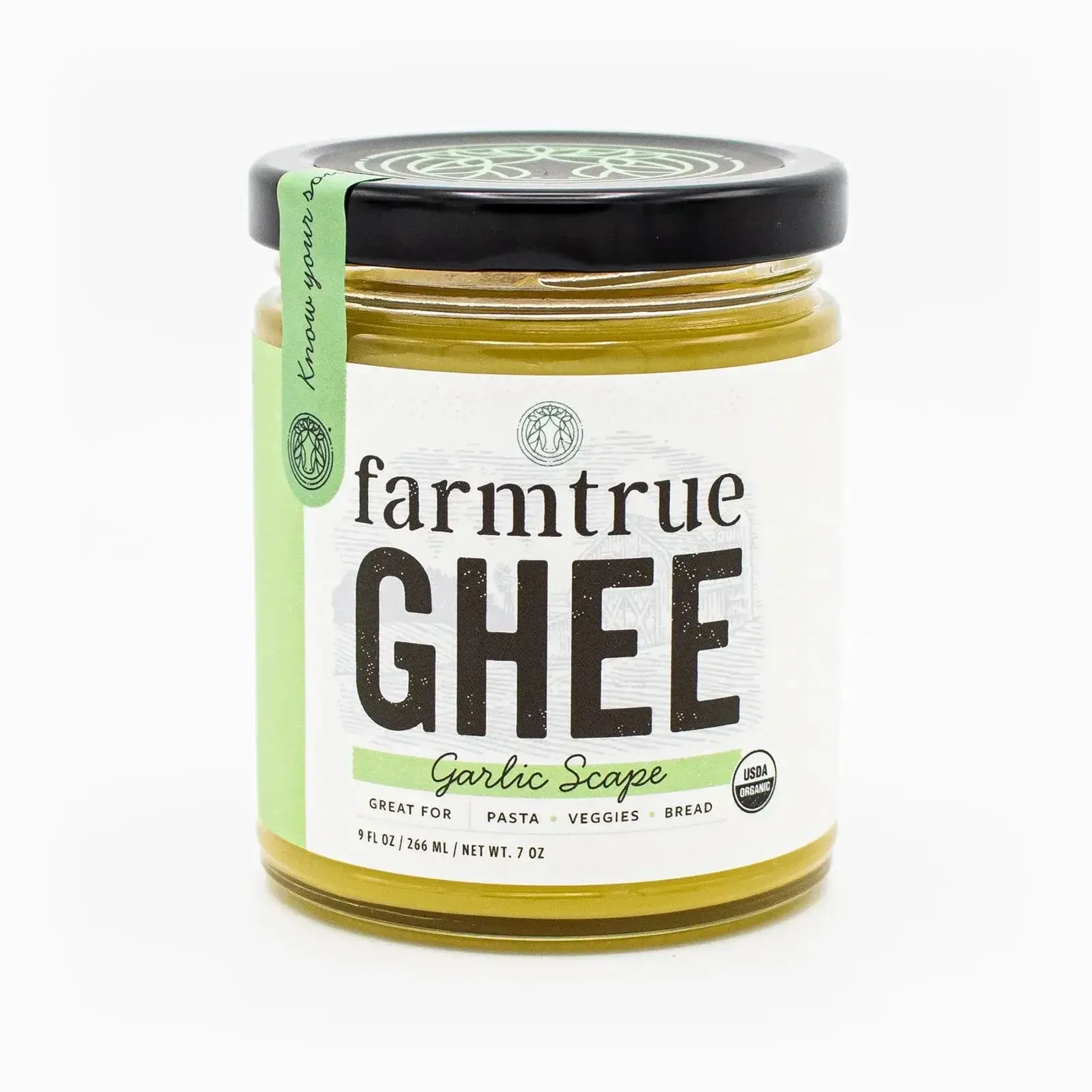 Garlic Scape ghee — the white-labelled jar with a green tab