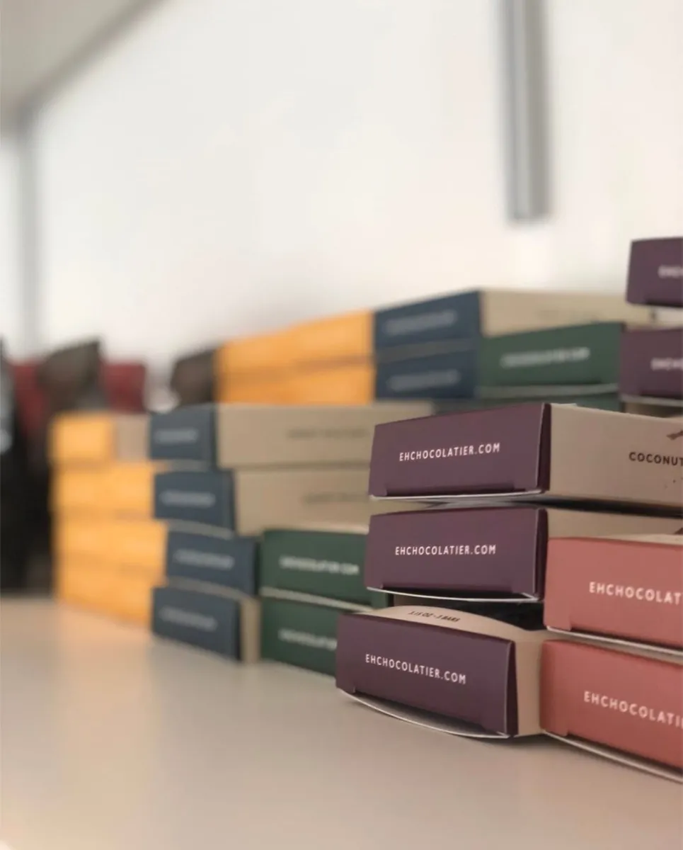 Boxes stacked on their sides, the colored spines reading as a set