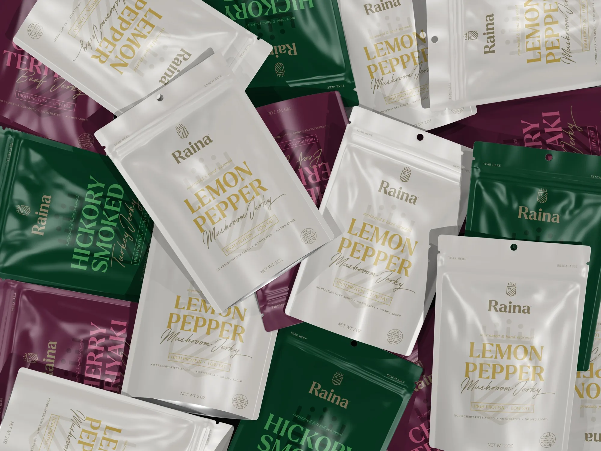 Raina pouches piled together — plum, green and cream — the flavor names showing at every angle