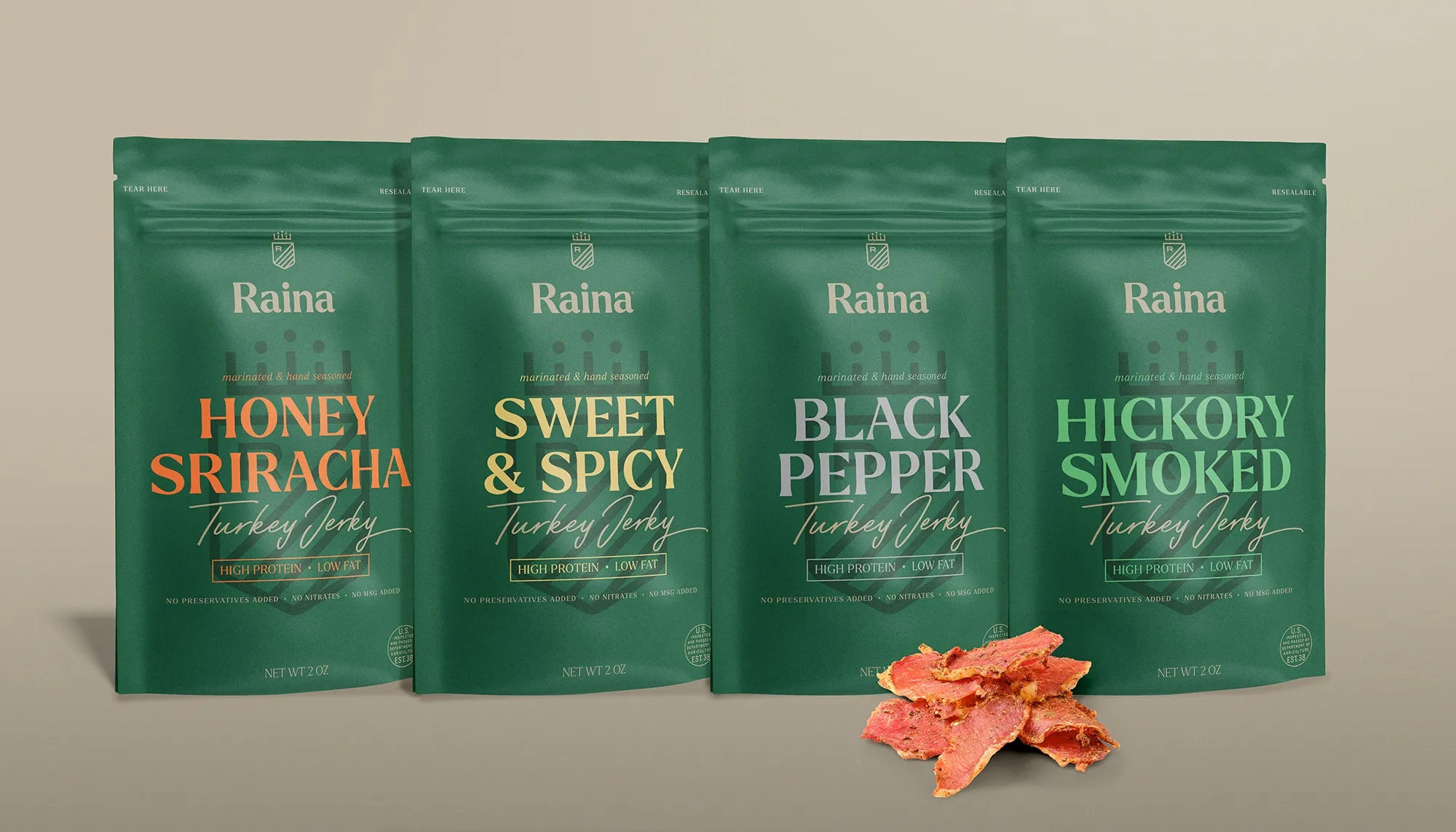The four turkey pouches in green — Honey Sriracha, Sweet & Spicy, Black Pepper, Hickory Smoked